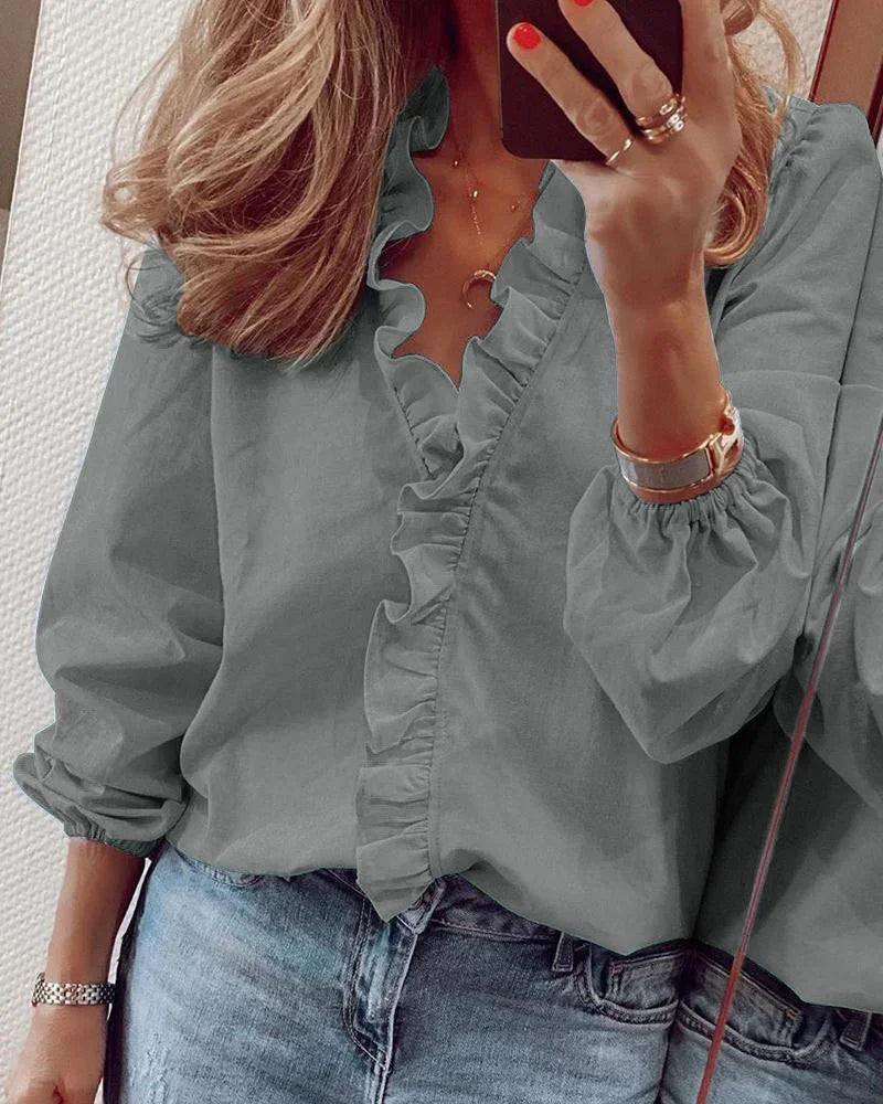 Women's Feminine Blouse with Playful Ruffles