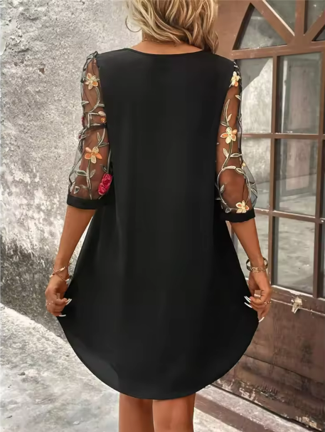 Women's Elegant dress with a V-neckline and eye-catching sleeves